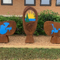 Three pieces of artwork depicting the Hoyt Lakes area in Minnesota.